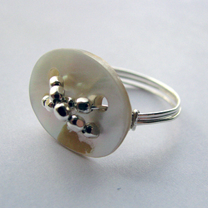 Wire wrapped button ring