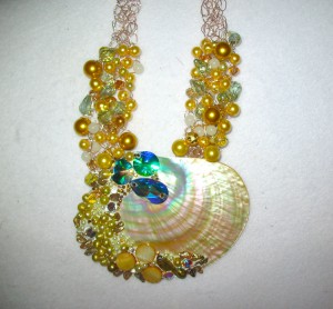 Judy Ellis's Gem Profile- Cowrie Shells, Conch Shells, and Drilling Shells - , General Education, , Shell and swarovski crystal necklace