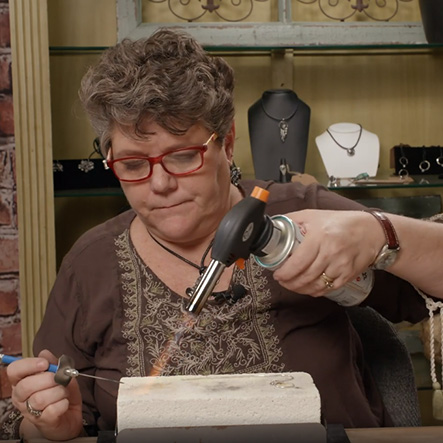 Judy Larson's Why You Should Take a Class - , General Education, , Kim using a butane torch
