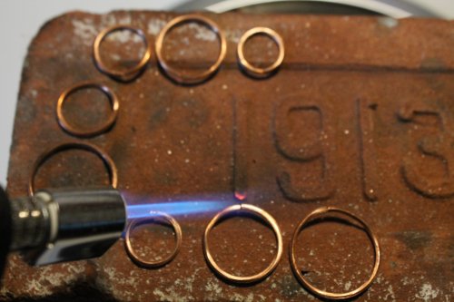 Judy Freyer Thompson's Circle Earrings - , Contemporary Wire Jewelry, Butane Torch, Soldering, Solder, Lay the smaller jump rings on the soldering brick.