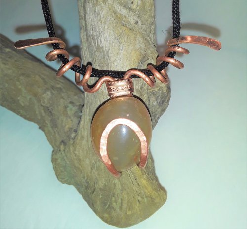 Judy Freyer Thompson's Captured Stone Pendant - , Contemporary Wire Jewelry, Coiling, Coiling Wire, Wire Coiling, Forging, Forging Jewelry, Jewelry Forging, Slide the necklace component through the coiled bail.