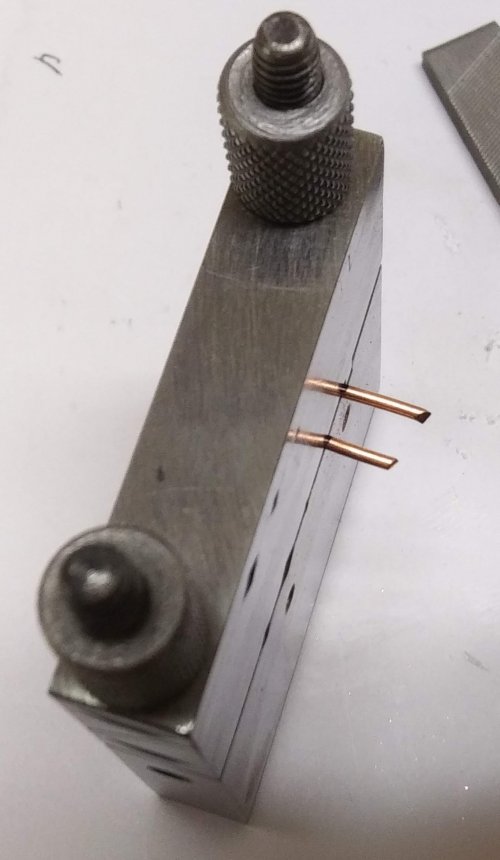 Judy Larson's Mixed Metal Sampler Bracelet 3 - , Metalwork, Filing, Finishing, How To Punch Holes, Hole Punching, Punch A Hole, Texturing, Butane Torch, Soldering, Solder, Design, Place a U shape in the 90 degree section of the miter jig 