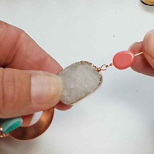 Debbie Blair's Adobe Sun Necklace - , Contemporary Wire Jewelry, Coiling, Coiling Wire, Wire Coiling, Dapping, Dapping Jewelry, How To Punch Holes, Hole Punching, Punch A Hole, Loops, Wire Loop, Wrapped Wire Loop, Beads, Use 2 of wire to form a wrapped loop