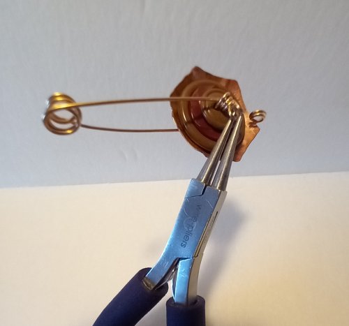 Judy Freyer Thompson's Stacked Button Charms - , Contemporary Wire Jewelry, Cutting, Cutting Tool, Cutters, Dapping, Dapping Jewelry, How To Punch Holes, Hole Punching, Punch A Hole, Loops, Wire Loop, Wrapped Wire Loop, Sawing, Saw, Wire Saw, Butane Torch, Soldering, Solder, Use the round nose pliers