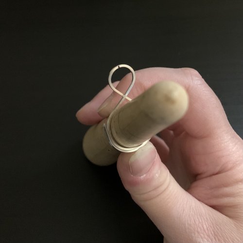 Kendra Austin's Infinity Earrings - Form the outer elements, Contemporary Wire Jewelry, Filing, Finishing, Forging, Forging Jewelry, Jewelry Forging, Lashing, Wire Lashing, Loops, Wire Loop, Wrapped Wire Loop, Fold the wire ends around the ring mandrel