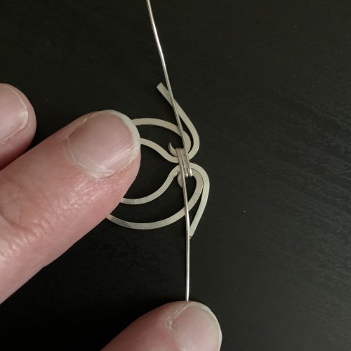 Kendra Austin's Infinity Earrings - Fit and attach the inner and outer elements, Contemporary Wire Jewelry, Filing, Finishing, Forging, Forging Jewelry, Jewelry Forging, Lashing, Wire Lashing, Loops, Wire Loop, Wrapped Wire Loop, You are now looking at the back of the piece.