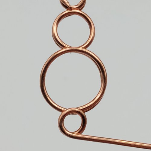 Erika Pal's Loop in Loop Earrings - , Contemporary Wire Jewelry, Loops, Wire Loop, Wrapped Wire Loop, Separate the wire from the pliers.