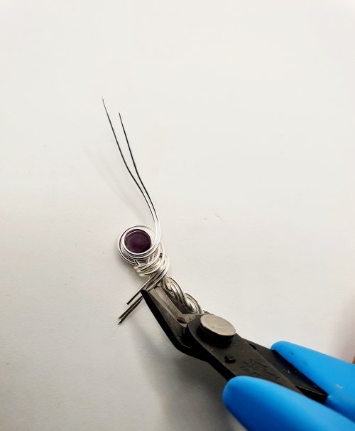 Natalie Patten's Braided Wire Cuff - , Contemporary Wire Jewelry, Spirals, Wire Spiral, Spiral Wire Wrap, Weaving, Wire Weaving, Weaving Wire, cutting off the excess and tuck in against the braid