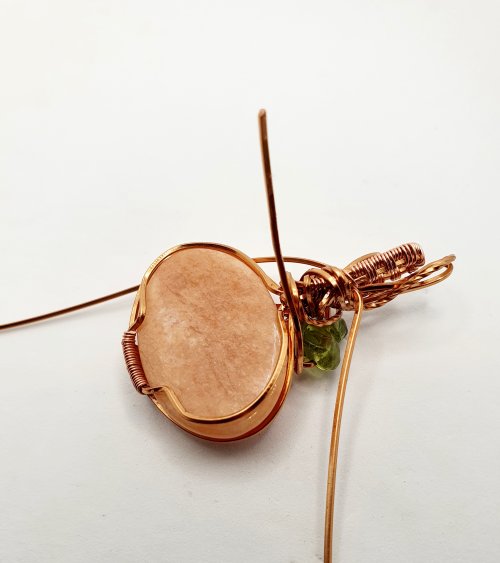 Natalie Patten's Classic Wrap Pumpkin Pendant - , Classic Wire Jewelry, Wire Wrapping, Wrapping, Wire Wrapping Jewelry, Weaving, Wire Weaving, Weaving Wire, Bring the wire around the back of the bail towards