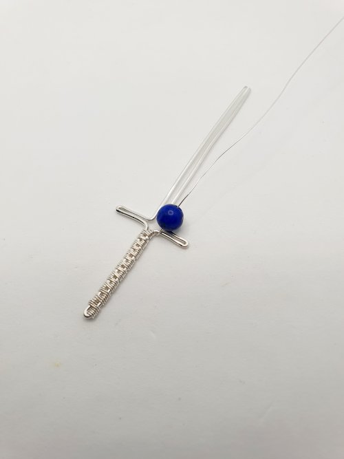 Natalie Patten's Woven Wire Cross Pendant - , Wire Weaving, Weaving, Wire Weaving, Weaving Wire, Thread your bead onto the weaving wire.