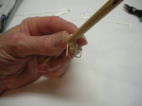 Judy Larson's Coiled Bead and Twisted Wire Bracelet - , Contemporary Wire Jewelry, Coiling, Coiling Wire, Wire Coiling, Wire Wrapping, Wrapping, Wire Wrapping Jewelry, , the 1 of coil you are using will make two full coil wraps.