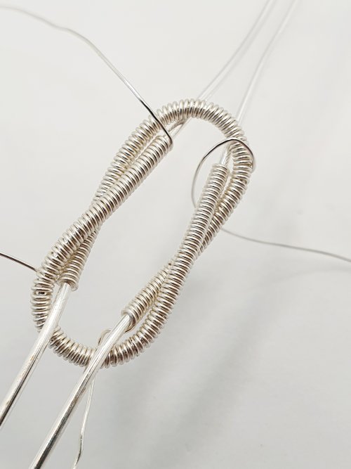 Natalie Patten's Interlocking Coil Bangle - , Contemporary Wire Jewelry, Coiling, Coiling Wire, Wire Coiling, Use the tail ends of the weaving wire
