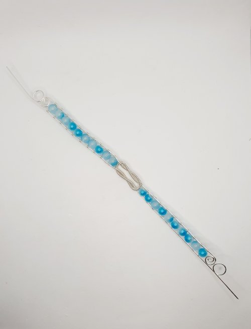 Natalie Patten's Interlocking Coil Bangle - , Contemporary Wire Jewelry, Coiling, Coiling Wire, Wire Coiling, Repeat this on the other side of the bangle.    