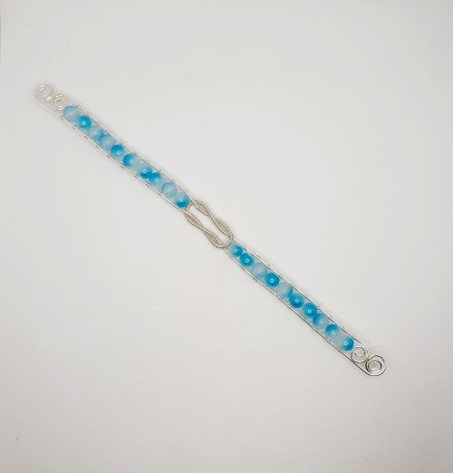 Natalie Patten's Interlocking Coil Bangle - , Contemporary Wire Jewelry, Coiling, Coiling Wire, Wire Coiling, Trim off any excess 0.4mm/26 gauge wire