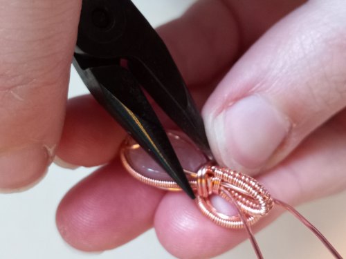 Elizabeth Schultz's Woven Wire Cabochon Pendant - , Wire Weaving, Weaving, Wire Weaving, Weaving Wire, Cut off the excess and tuck in the wire with your chain nose pliers.    