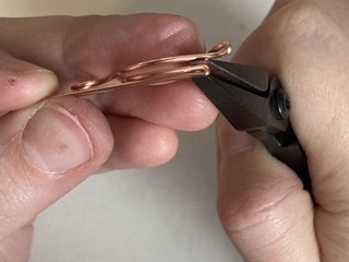 Elizabeth Schultz's Woven Leaf Earrings - , Wire Weaving, Weaving, Wire Weaving, Weaving Wire, compress the wire with your pliers.    