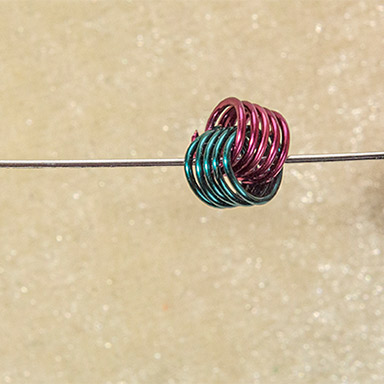 Nancy Chase's Spring Dreams Earrings - , Contemporary Wire Jewelry, Coiling, Coiling Wire, Wire Coiling, thread the coil knots onto the headpin