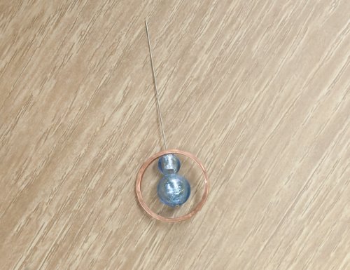 Kylie Jones's Beaded RIng Pendant - , Contemporary Wire Jewelry, Texturing, Butane Torch, Soldering, Solder, pull the headpin all the way through the hole