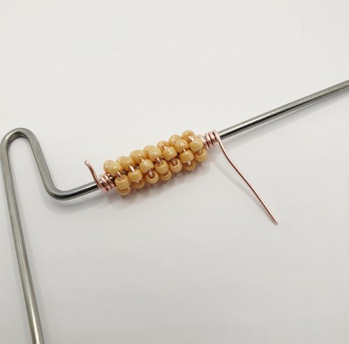 Natalie Patten's Beaded Coiled Wire Beads - , Contemporary Wire Jewelry, Coiling, Coiling Wire, Wire Coiling, Beads, finish by wrapping bare wire 3 times