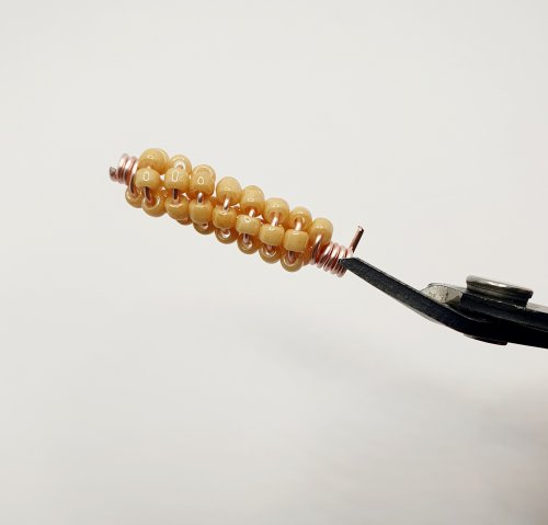 Natalie Patten's Beaded Coiled Wire Beads - , Contemporary Wire Jewelry, Coiling, Coiling Wire, Wire Coiling, Beads, trim the wire on the other side of the bead