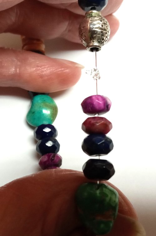 Judy Larson's Stretch Bracelets - , Beading, Beads, add a dab of glue to the knot