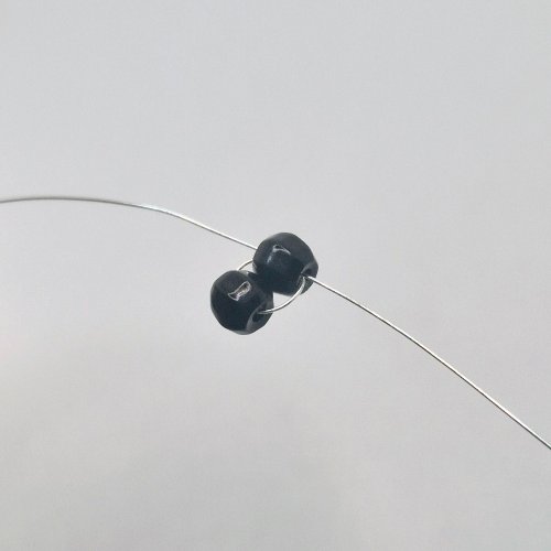 Natalie Patten's The Purrfect Feline Pendant - , Contemporary Wire Jewelry, Loops, Wire Loop, Wrapped Wire Loop, Weaving, Wire Weaving, Weaving Wire, Beads, Gently pull both wire ends away from each other 