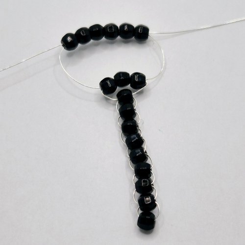 Natalie Patten's The Purrfect Feline Pendant - , Contemporary Wire Jewelry, Loops, Wire Loop, Wrapped Wire Loop, Weaving, Wire Weaving, Weaving Wire, Beads,  add six beads to one of the wire tails