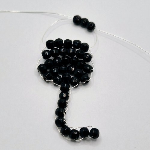 Natalie Patten's The Purrfect Feline Pendant - , Contemporary Wire Jewelry, Loops, Wire Loop, Wrapped Wire Loop, Weaving, Wire Weaving, Weaving Wire, Beads, Add three beads to one of the wire tails