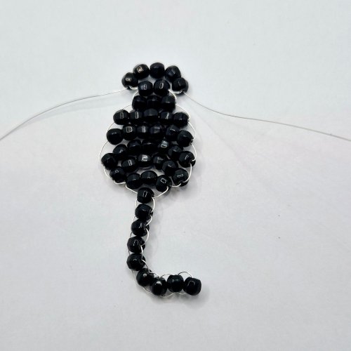 Natalie Patten's The Purrfect Feline Pendant - , Contemporary Wire Jewelry, Loops, Wire Loop, Wrapped Wire Loop, Weaving, Wire Weaving, Weaving Wire, Beads, Gently pull both wires to shape the row