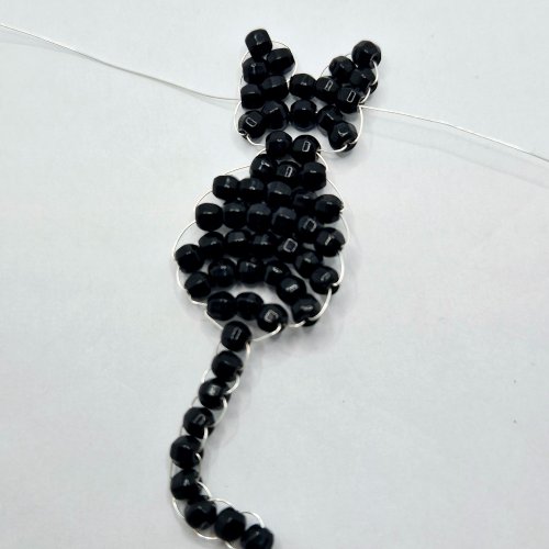 Natalie Patten's The Purrfect Feline Pendant - , Contemporary Wire Jewelry, Loops, Wire Loop, Wrapped Wire Loop, Weaving, Wire Weaving, Weaving Wire, Beads,  wire should now be travelling out of the top