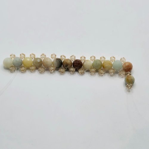 Natalie Patten's Right Angle Weave Memory Bangle - , Contemporary Wire Jewelry, Lashing, Wire Lashing, Beads, Memory wire,  run the thread back through the 4 beads