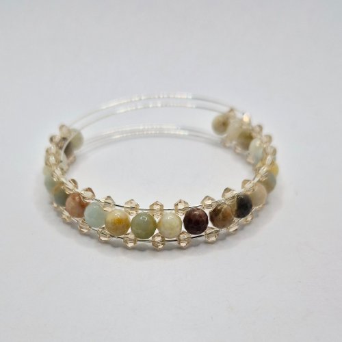 Natalie Patten's Right Angle Weave Memory Bangle - , Contemporary Wire Jewelry, Lashing, Wire Lashing, Beads, Memory wire,  runs through the row of bicones