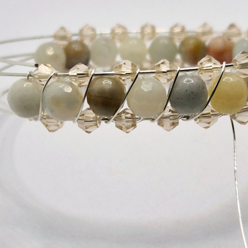 Natalie Patten's Right Angle Weave Memory Bangle - , Contemporary Wire Jewelry, Lashing, Wire Lashing, Beads, Memory wire, Bring the wire through the middle