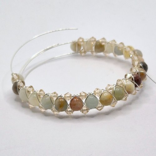 Natalie Patten's Right Angle Weave Memory Bangle - , Contemporary Wire Jewelry, Lashing, Wire Lashing, Beads, Memory wire, Continue to bring the weaving wire