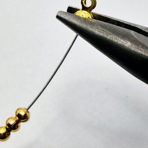 Natalie Patten's Wrapped Loop Charm Bramble - , Beading, Loops, Wire Loop, Wrapped Wire Loop, Design, Beads, Slide the calotte up over the crimp beads.