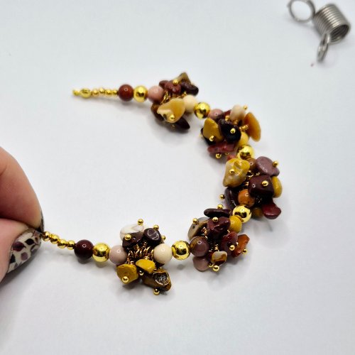 Natalie Patten's Wrapped Loop Charm Bramble - , Beading, Loops, Wire Loop, Wrapped Wire Loop, Design, Beads, Create a curve in the bracelet.