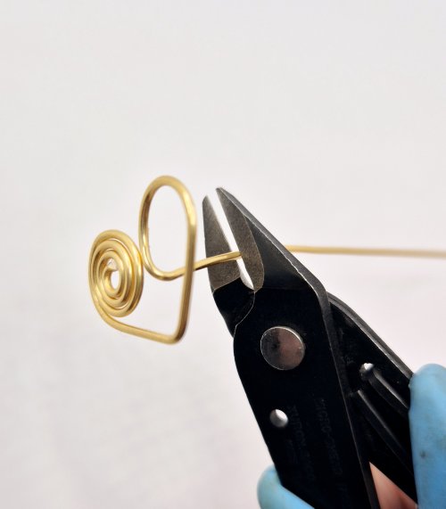 Natalie Patten's Filled Heart Earrings - , Contemporary Wire Jewelry, Spirals, Wire Spiral, Spiral Wire Wrap, Wire Wrapping, Wrapping, Wire Wrapping Jewelry, Design, Trim off any remaining wire.
