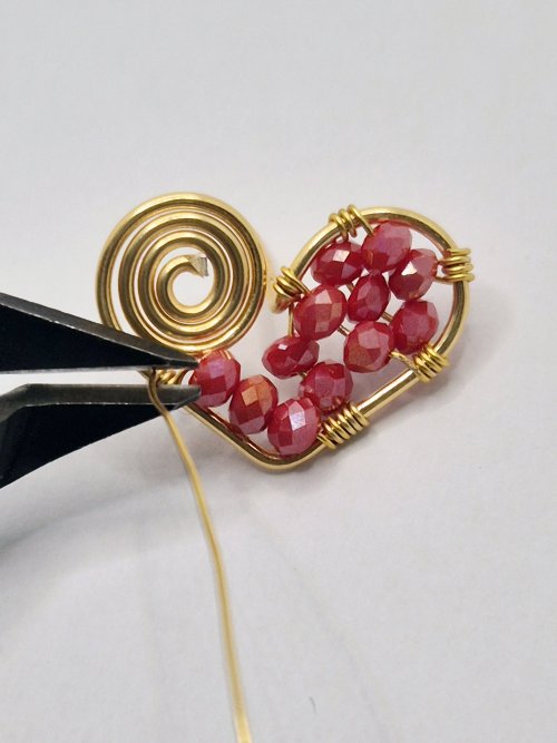 Natalie Patten's Filled Heart Earrings - , Contemporary Wire Jewelry, Spirals, Wire Spiral, Spiral Wire Wrap, Wire Wrapping, Wrapping, Wire Wrapping Jewelry, Design,  trim off any excess weaving wire