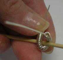 Judy Larson's How to Make a Wire Coil and Bead - , Findings & Components, Toggles & Clasps, Earwire & Headpin, Coiling, Coiling Wire, Wire Coiling, Findings, Clasps, Components, Wire Wrapping, Wrapping, Wire Wrapping Jewelry, Pull the core wire up over 