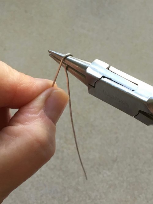 Denise Peck's An Alternative Way to Use Your Pliers - , Wire Jewelry Design, Coiling, Coiling Wire, Wire Coiling, Loops, Wire Loop, Wrapped Wire Loop, Wire Wrapping, Wrapping, Wire Wrapping Jewelry, Weaving, Wire Weaving, Weaving Wire, Hold the 90 bend in the round nose pliers