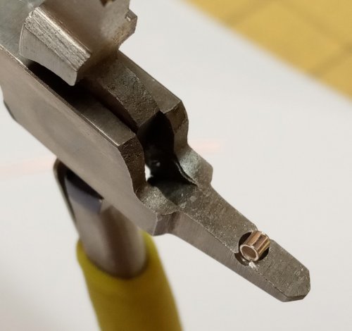 Judy Larson's Using Magical Crimping Pliers - Crimping a Bead, Tools For Wire Jewelry, Beads, Tools, trough on each side of the impression