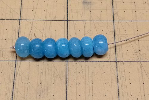 Judy Larson's Bead Cap Primer - What bead caps can do for my rondelle beads:, Wire Jewelry Design, Dapping, Dapping Jewelry, Filing, Finishing, How To Punch Holes, Hole Punching, Punch A Hole, Seven 10mm rondelle beads string 