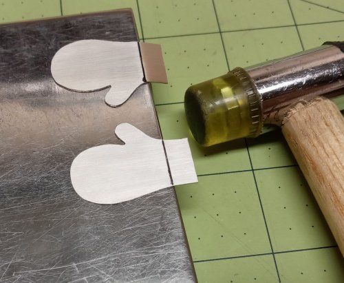 Judy Larson's Separating Distinct Textures on a Single Piece of Metal - , Wire Jewelry Design, Texturing, Place the metal piece on a bench block
