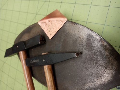 Judy Larson's Separating Distinct Textures on a Single Piece of Metal - , Wire Jewelry Design, Texturing, Holding it in place so the bend in the metal edge stays