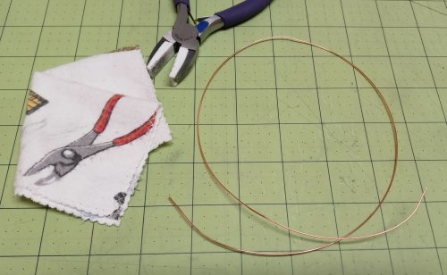 Judy Larson's Simple Way to Straighten Wire - , General Education, , throw the flannel piece in the wash before using it to clean your glasses