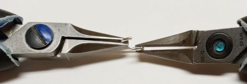 Judy Larson's Wire Basics - Opening and Closing Jump Rings - Open the ring, General Education, , Twist your wrist and pliers 