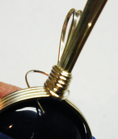 Judy Larson's Wire Wrapped Bail Finishing Options - , General Education, Wire Wrapping, Wrapping, Wire Wrapping Jewelry, Slip the wrap wire tail between the cabochon and bezel