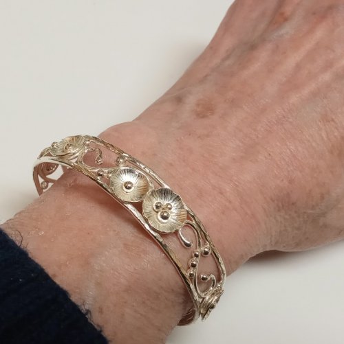 Judy Larson's Putting On and Taking Off a Cuff Bracelet - , General Education, ,  centered between the tendons