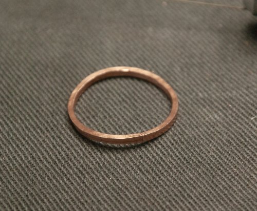 Kylie Jones's Using Your Saw to Tighten a Join  - , General Education, , I rest the ring against the bench pin