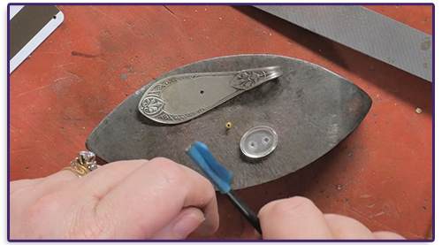 Kim St. Jean's Bezel-Set Spoon Pendant by Kim St. Jean - , Metalwork, Riveting, Riveting Techniques, Wire Rivets, Sawing, Saw, Wire Saw, Texturing, Butane Torch, Soldering, Solder, using-a-vise-for-a-flaring-tool